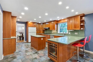Spacious Eat-In Kitchen features ceramic tile floo