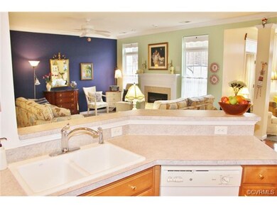 Breakfast bar overlooks the dining area and living room.