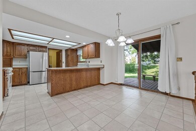Kitchen with casual dining space.  Sliding doors t