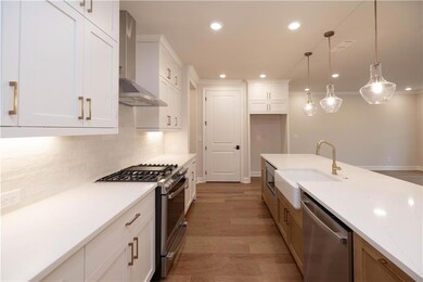 HOME is UNDER CONSTRUCTION with a SUMMER MOVE-IN. Photos are not of the home but of another Ellington Townhome in Ward's Crossing