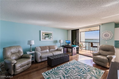 Living room featuring hardwood / wood-style floori