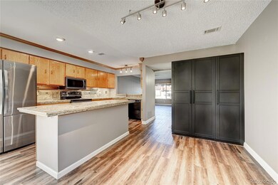 1283 S Crystal Way, Aurora, CO 80012 - photo 2