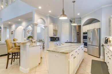 Kitchen open to living areas.
