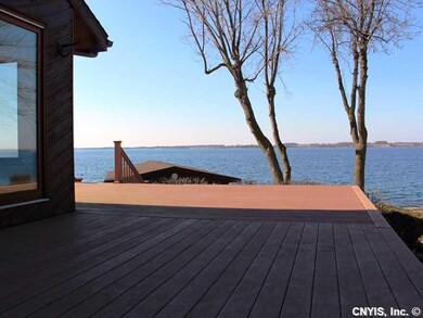 Waterfront. Easy low care composite deck. Notice t