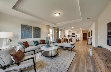 Spacious gathering room *Photos of furnished model