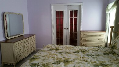Master BR- doors lead to Master Bath