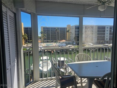 Sunroom with a water view
