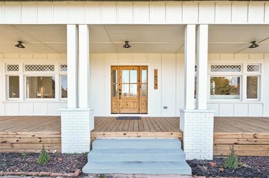 Property entrance with a porch