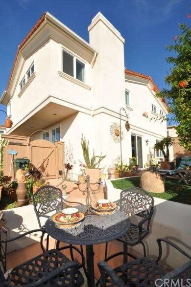 Backyard and patio has view over rooftops