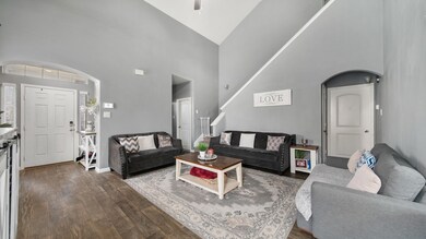 Family room boast high ceilings.