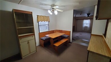 Eat In Kitchen includes storage cabinets and Corne