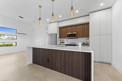 Kitchen featuring appliances with stainless steel 