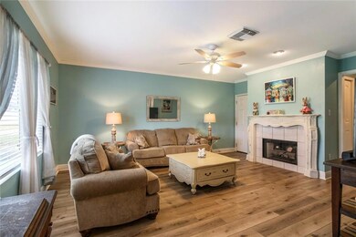 Den w/ wood burning fireplace