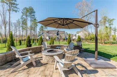 The paver patio with gas firepit is really the ici