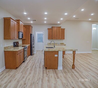 KITCHEN LOOKING FROM DINING ROOM