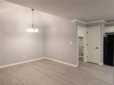 Dining Area with vaulted ceiling