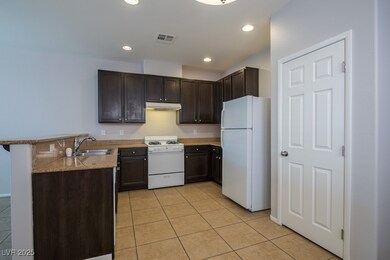 7706 Ornamento Way, Las Vegas, NV 89179 - photo 4