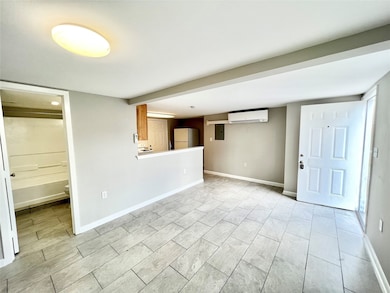 Wide-open and versatile, this living room works as