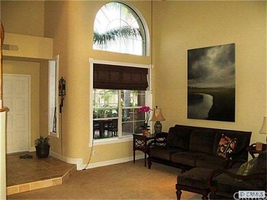 inviting formal living room with vaulted ceiling a