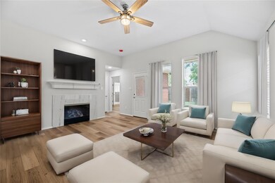 Virtually Staged_Living room with light wood-type 