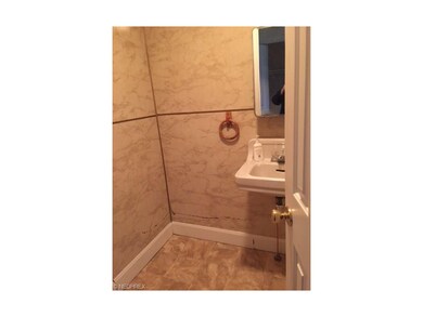 Downstairs half bath. A Full bath off first floor 