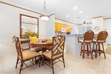 Dining area with light tile patterned flooring, ce