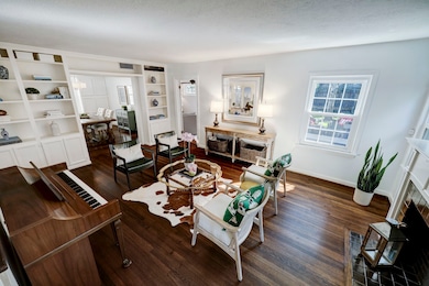 View of formal living room looking to dining room