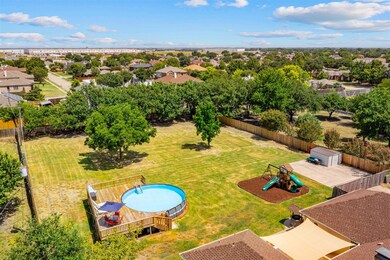 Just shy of 1 full acre, this backyard is a RARE f
