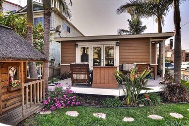 French doors lead from living room to outdoor Trex