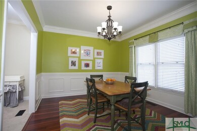 Formal Dining With Hardwood Floors