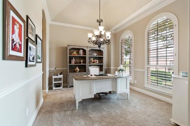 Light and bright formal dining room with  plantati