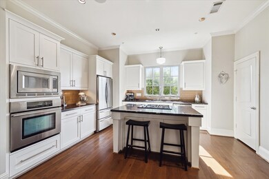 A light-filled, gourmet kitchen awaits the chef on
