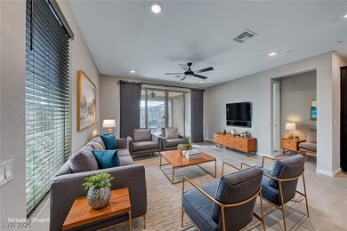 Living room with visible vents, recessed lighting,
