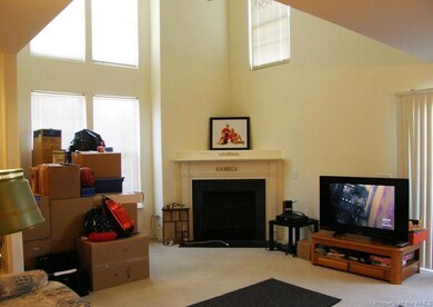 Gas fireplace in open living room.