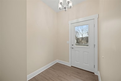 As you enter the spacious foyer you'll notice the