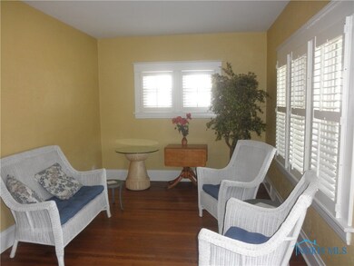 LIVING ROOM WITH  UPDATED WINDOWS TO ENJOY THE NAT