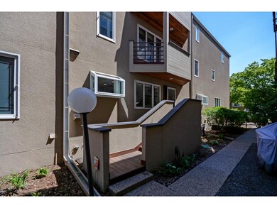 Stucco building with private entry to unit