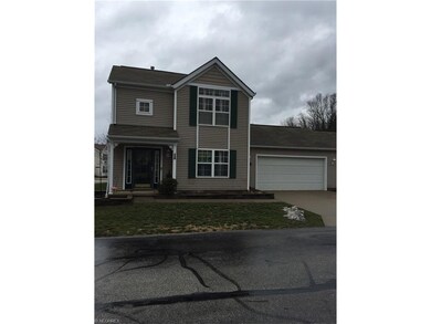 Front view with garage.