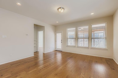 Unfurnished room featuring light wood-type floori