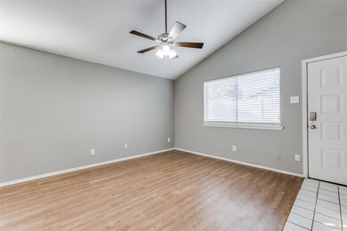 Living room featuring light wood-type flooring, hi