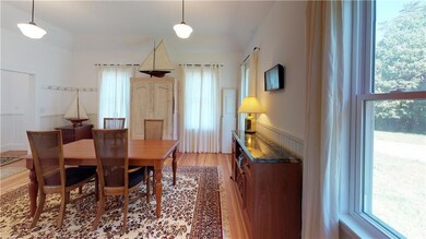 View of dining room and front...