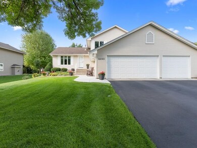 Newer garage doors and sidewalk