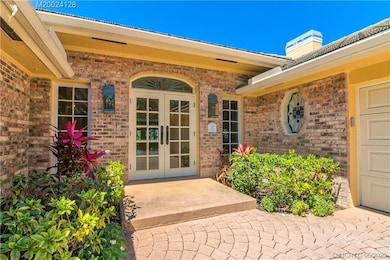 Front entrance offers double French Doors