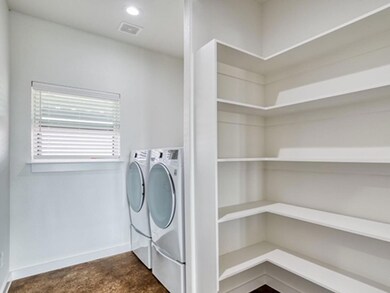 Clothes washing area with separate washer and dryer