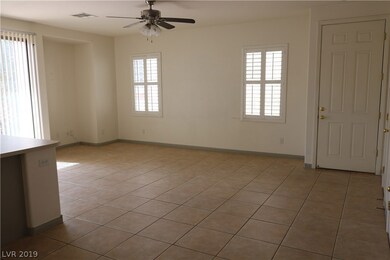 20x13 living room features ceiling fan, window shu