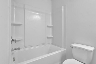Full bathroom with toilet