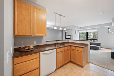 Kitchen has tile floors and granite countertops