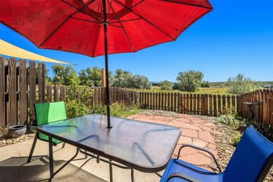 Fenced backyard is great for pets and outdoor ente