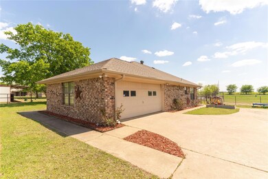 Garage and driveway.