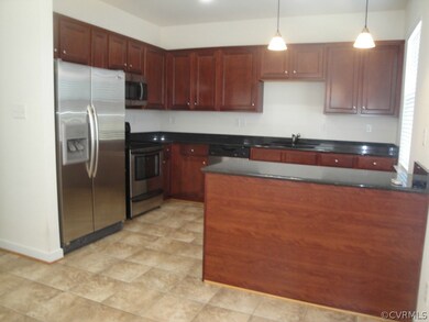 Gourmet Kitchen with granite counters, recessed li